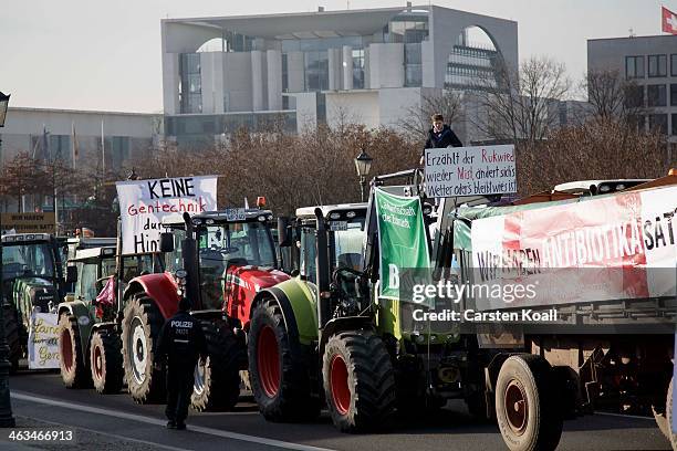 Tractors line up in front of the chancellory to protest at a rally on January 18, 2014 in Berlin, Germany. Several thousand demonstrators attended...