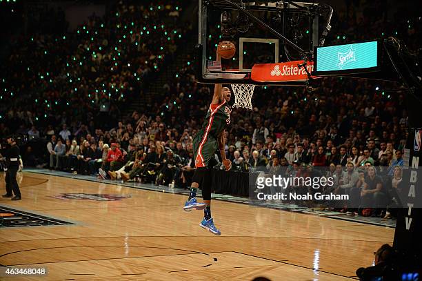 Giannis Antetokoumpo of the Milwaukee Bucks attempts a dunk during the Sprite Slam Dunk Contest on State Farm All-Star Saturday Night as part of the...