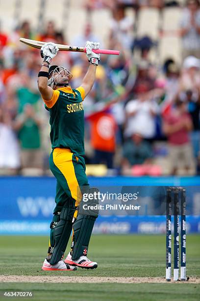 Duminy of South Africa celebrates his century during the 2015 ICC Cricket World Cup match between South Africa and Zimbabwe at Seddon Park on...