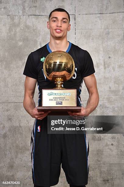 Zach LaVine of the Minnesota Timberwolves poses with his trophy after winning the Sprite Slam Dunk Contest on State Farm All-Star Saturday Night as...