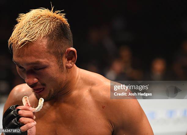 Kiichi Kunimoto walks back to his corner between rounds against Neil Magny in their welterweight fight during the UFC Fight Night event inside...