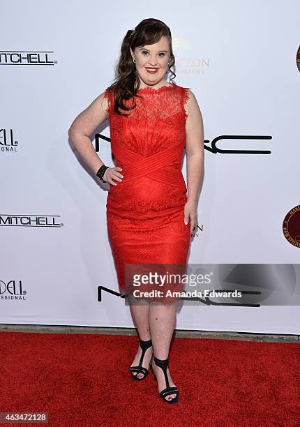 Actress Jamie Brewer arrives at the Make-Up Artists & Hair Stylists Guild Awards at the Paramount Theater on the Paramount Studios lot on February...