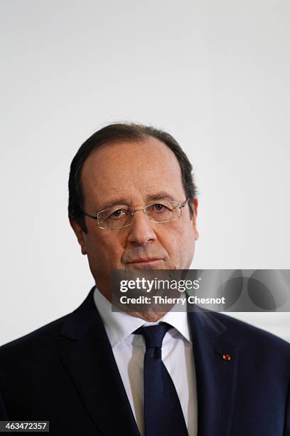 French President Francois Hollande looks on during the opening of a fire and rescue department on January 18, in Tulle, France. Francois Hollande...