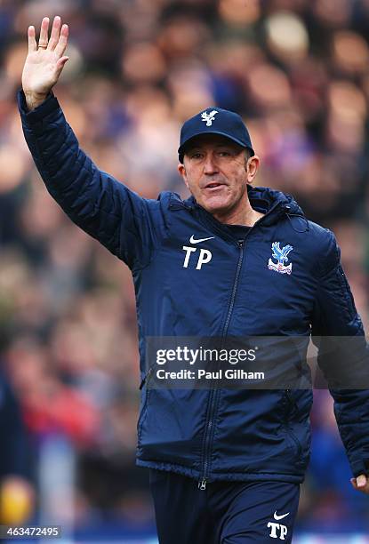 Crystal Palace manager Tony Pulis waves as he walks out during the Barclays Premier League match between Crystal Palace and Stoke City at Selhurst...