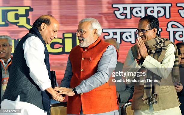 Prime Ministerial candidate Narendra Modi, president Rajnath Singh and Madhya Pradesh Chief Minister Shivraj Singh Chauhan at the BJP National...