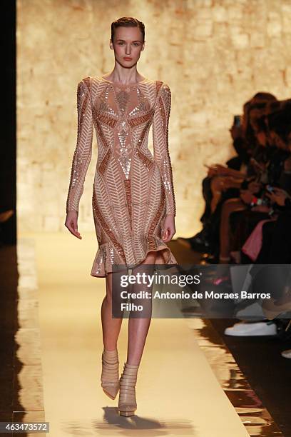 Model walks the runway during the Herve Leger By Max Azria show at The Theater at Lincoln Center on February 14, 2015 in New York City.