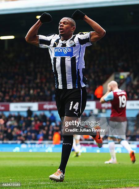 Loic Remy of Newcastle United celebrates scoring his teams second goal during the Barclays Premier League match between West Ham United and Newcastle...
