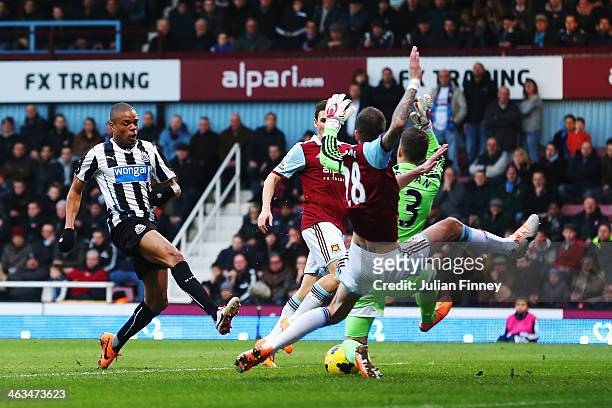 Loic Remy of Newcastle United scores his teams second goal during the Barclays Premier League match between West Ham United and Newcastle United at...
