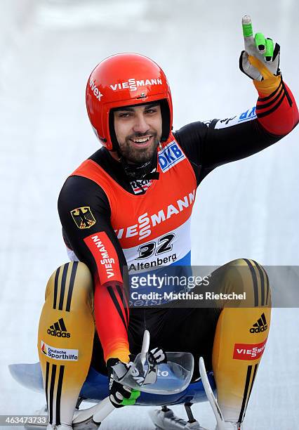 Third placed Andi Langenhan of Germany reacts after crossing the finish line during the FIL Viessmann Luge World Cup Men event at the DKB Eiskanal...