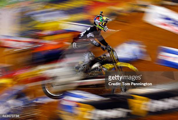 Aj Catanzaro rider of the Suzuki RM-Z races the field during the 250SX Main during the Monster Energy AMA Supercross at AT&T Stadium on February 14,...