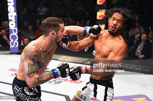 Brandon Thatch lands a punch to the face of Benson Henderson in their welterweight fight during the UFC Fight Night event inside 1stBank Center on...