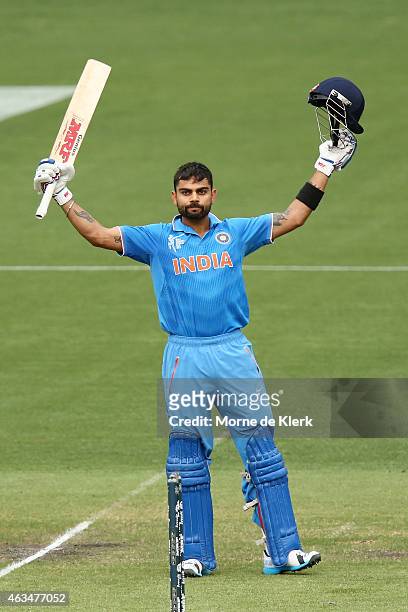 Virat Kohli of India celebrates after reaching 100 runs during the 2015 ICC Cricket World Cup match between India and Pakistan at Adelaide Oval on...