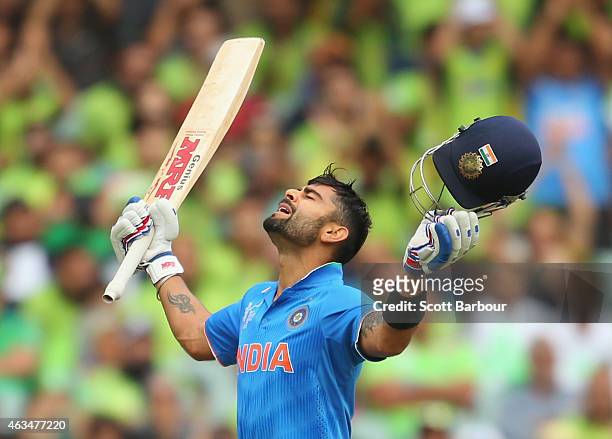 Virat Kohli of India celebrates as he reaches his century during the 2015 ICC Cricket World Cup match between India and Pakistan at Adelaide Oval on...