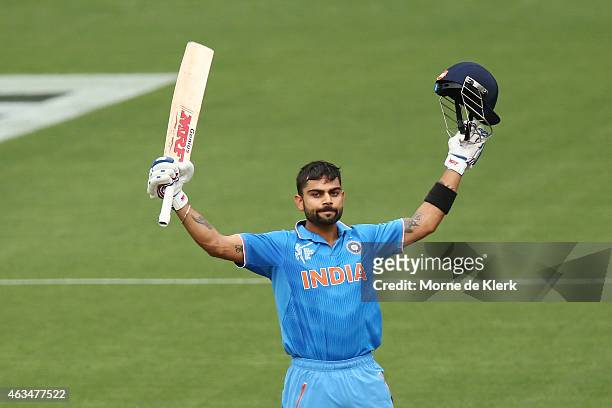 Virat Kohli of India celebrates after reaching 100 runs during the 2015 ICC Cricket World Cup match between India and Pakistan at Adelaide Oval on...
