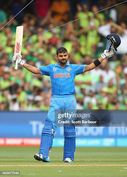 Virat Kohli of India celebrates as he reaches his century during the 2015 ICC Cricket World Cup match between India and Pakistan at Adelaide Oval on...