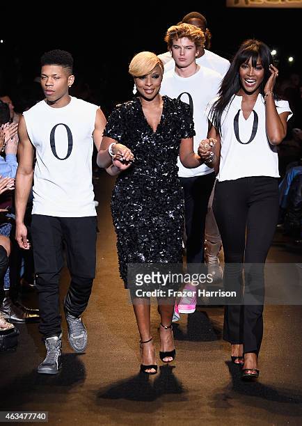 Bryshere Gray, Mary J. Blige and Naomi Campbell walk the runway at #TackleEbola at Naomi Campbell's Fashion For Relief Charity Fashion Show during...