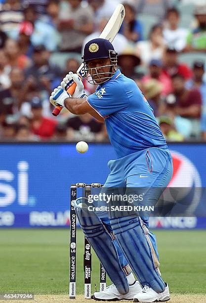 India's Mahendra Singh Dhoni plays a shot during the Pool B 2015 Cricket World Cup match between India and Pakistan at the Adelaide Oval on February...