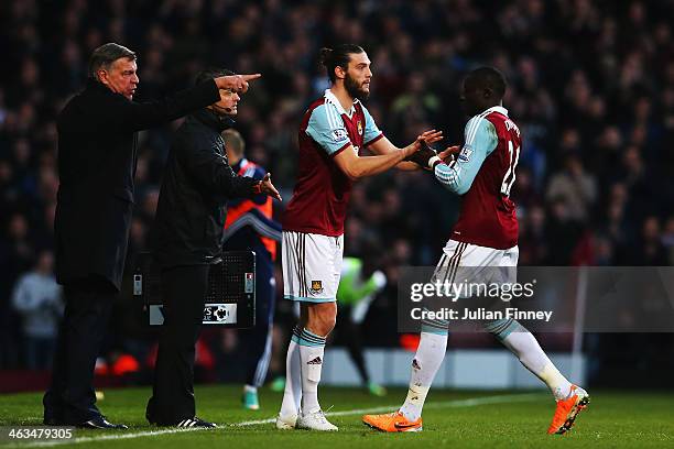 West Ham United manager Sam Allardyce sends on Andy Carroll to replace Mohamed Diamé during the Barclays Premier League match between West Ham United...