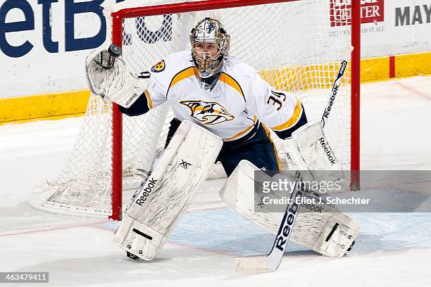 Goaltender Marek Mazanec of the Nashville Predators defends the net against the Florida Panthers at the BB&T Center on January 4, 2014 in Sunrise,...