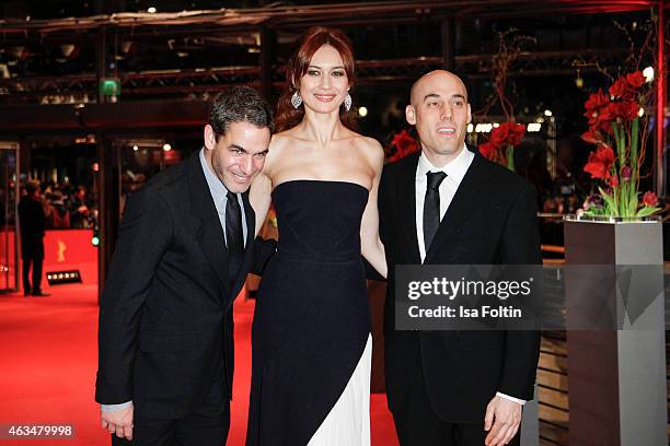 Fernando Eimbcke, Olga Kurylenko and Joshua Oppenheimer attend the Closing Ceremony of the 65th Berlinale International Film Festival on February 14,...