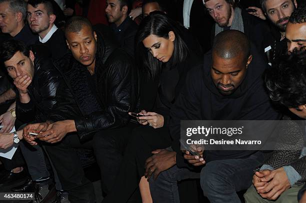 Kim Kardashian and Kanye West attend the Robert Geller fashion show during Mercedes-Benz Fashion Week Fall 2015 at Pier 59 on February 14, 2015 in...