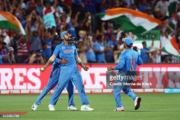 Virat Kohli of India celebrates after taking a catch to dismiss Shahid Afridi of Pakistan during the 2015 ICC Cricket World Cup match between India...