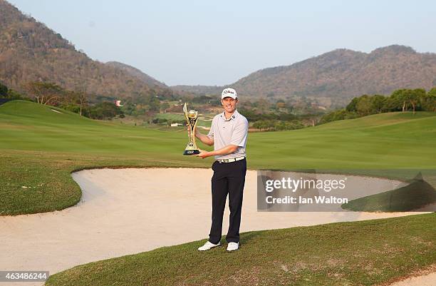 Andrew Dodt of Australia celebrates with the trophy after winning the final round of the 2015 True Thailand Classic at Black Mountain Golf Club on...