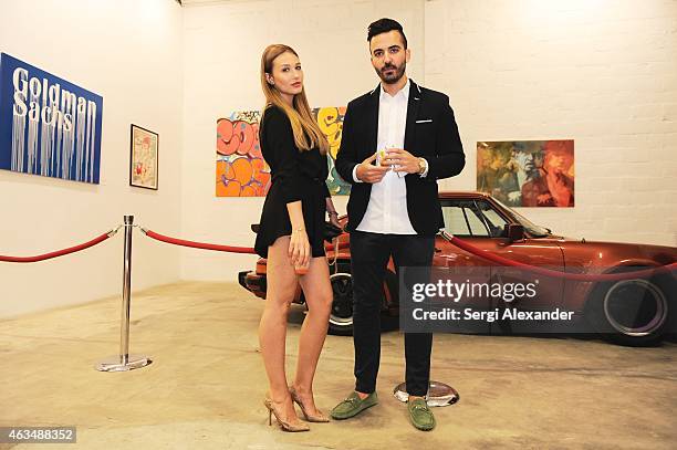 Kseniya Ivanova and Amir Mort attend the Fine Art Auction & Guntram von Habsburg Foundation Cocktail Reception Hosted By Hublot & Rhum Clement at...