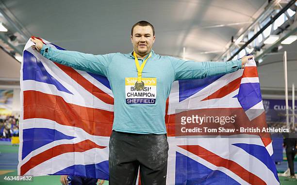Zane Duquemin of Great Britain celebrates winning gold in the mens shot put during day 2 of the Sainsbury's British Athletics Indoor Championships at...