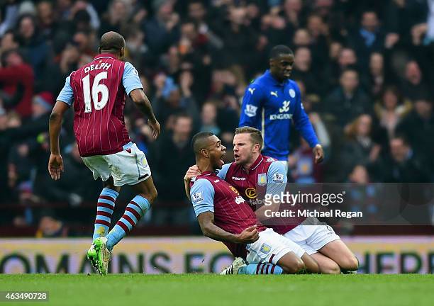 Leandro Bacuna of Aston Villa celebrates scoring the opening goal with Tom Cleverley snd Fabian Delph of Aston Villa during the FA Cup fifth round...