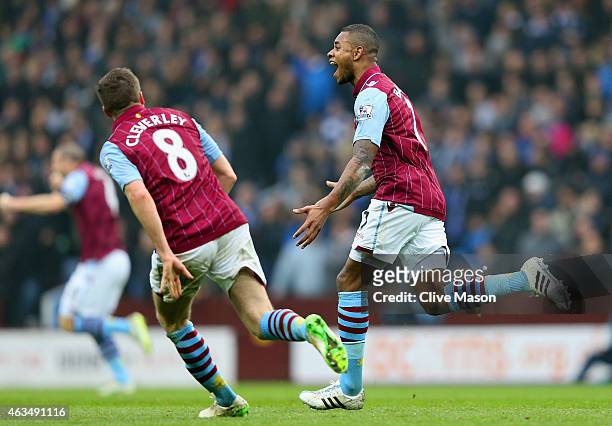 Leandro Bacuna of Aston Villa celebrates scoring the opening goal with Tom Cleverley of Aston Villa during the FA Cup fifth round match between Aston...