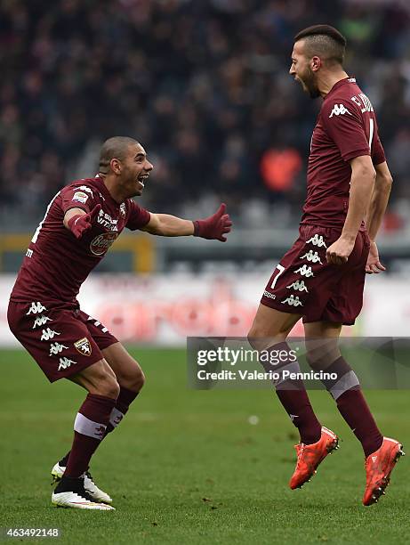 Omar El Kaddouri of Torino FC celebrates his goal with team mate Bruno Peres during the Serie A match between Torino FC and Cagliari Calcio at Stadio...