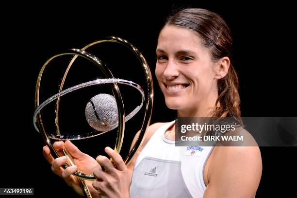 German player Andrea Petkovic holds the trophy of the WTA Antwerp Diamond Games tennis tournament in Antwerp on February 15, 2015. AFP PHOTO / BELGA...