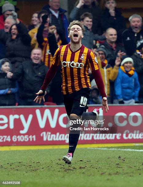 Billy Clarke of Bradford City celebrates after his shot on goal deflected off John O'Shea of Sunderland into the net, putting Bradford in front...