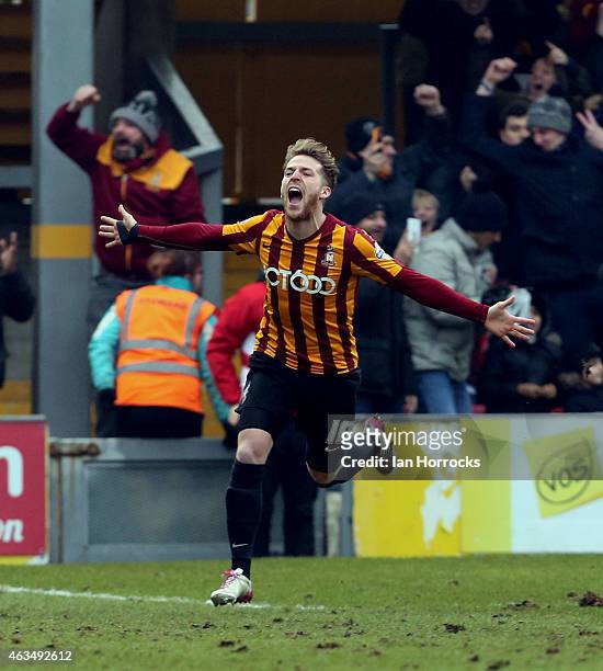 Billy Clarke of Bradford City celebrates after his shot on goal deflected off John O'Shea of Sunderland into the net, putting Bradford in front...