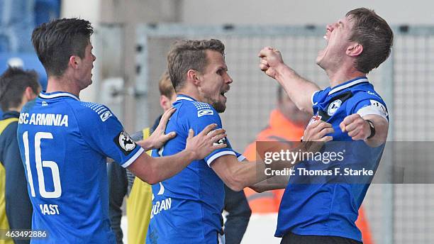 Dennis Mast, Sebastian Schuppan and Fabian Klos of Bielefeld celebrate during the Third League match between Arminia Bielefeld and MSV Duisburg at...