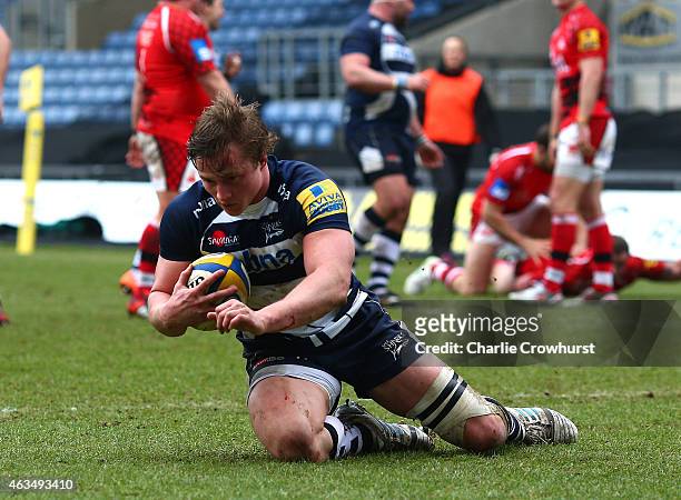 Tommy Taylor of Sale goes over to score a try during the Aviva Premiership match between London Welsh and Sale Sharks at The Kassam Stadium on...