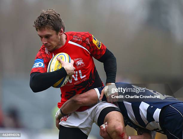 Nic Reyonlds of London Welsh is held in the tackle during the Aviva Premiership match between London Welsh and Sale Sharks at The Kassam Stadium on...