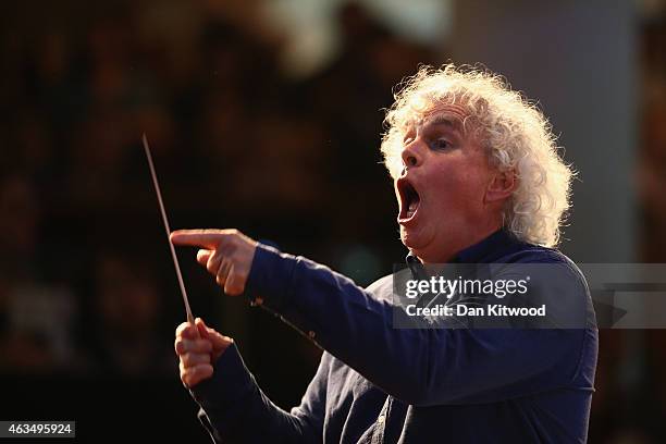 Sir Simon Rattle leads the 100 piece 'Young Orchestra for London' at London's South Bank on February 15, 2015 in London, England. The 'Young...