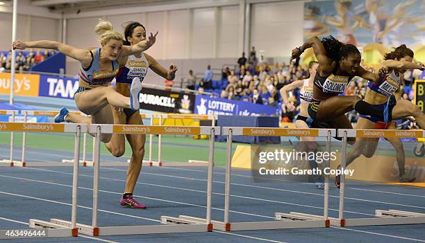 Serita Solomon jumps the last ahead of Lucy Hatton on her way to winning the womens 60 metres hurdles during the Sainsbury's British Athletics Indoor...