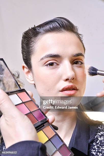 Model poses backstage at the Herve Leger by Max Azria fashion show at The Theatre at Lincoln Center on February 14, 2015 in New York City.