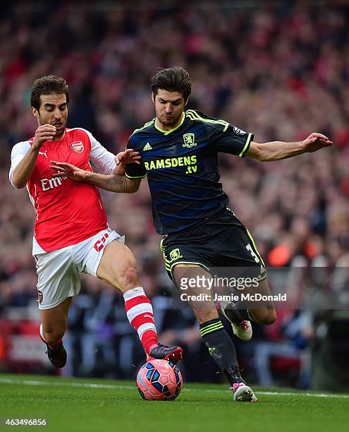 Mathieu Flamini of Arsenal tackles George Friend of Middlesbrough during the FA Cup fifth round match between Arsenal and Middlesbrough at Emirates...
