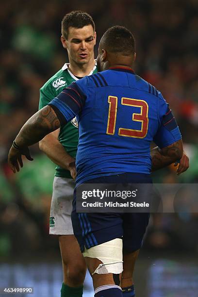 Jonathan Sexton of Ireland shakes hands with Mathieu Bastareaud of France at the final whistle during the RBS Six Nations match between Ireland and...