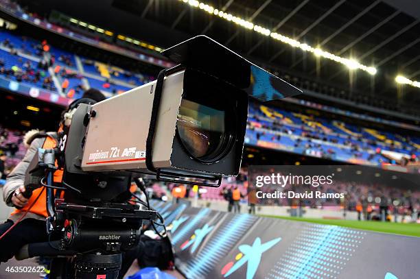 Television cameraman films the warm up prior to the La Liga match between FC Barcelona and Levante UD at Camp Nou on February 15, 2015 in Barcelona,...