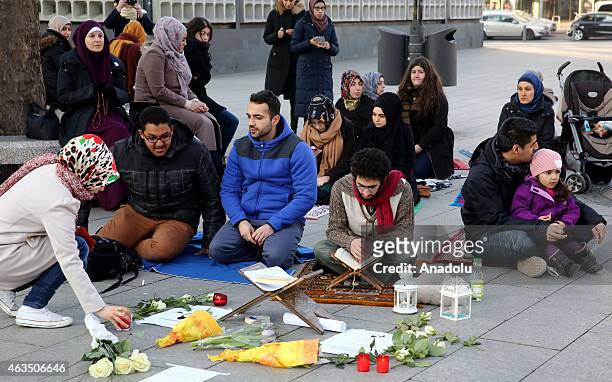 Group of demonstrators gather at Breitscheidplatz square to protest against the Chapel Hill shooting, in Berlin, Germany on February 15, 2015. Three...