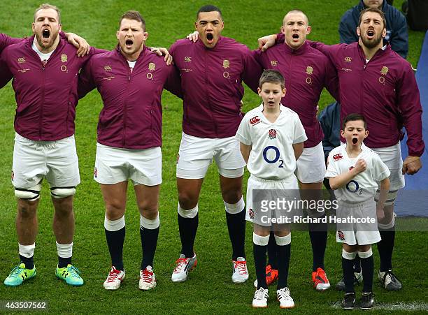 Mascot Harry Westlake sings the national anthem with the England team during the RBS Six Nations match between England and Italy at Twickenham...