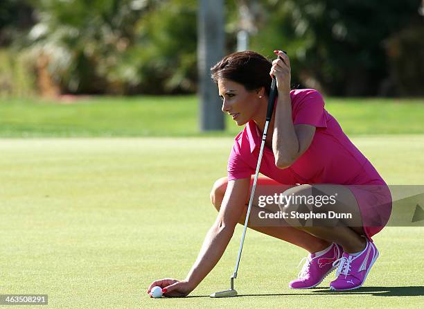 Holly Sonders places her ball on the green on the second hole during the third round of the Humana Challenge in partnership with the Clinton...