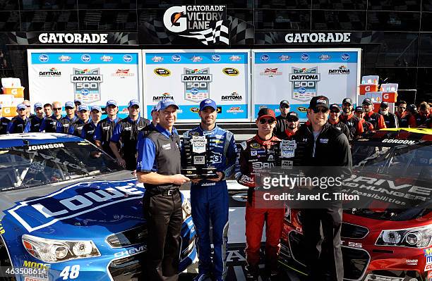 Jeff Gordon, driver of the Drive To End Hunger Chevrolet, his crew chief, Alan Gustafson, Jimmie Johnson, driver of the Lowe's Chevrolet, and his...