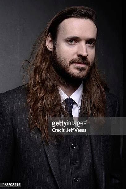 Director Mike Cahill poses for a portrait during the 2014 Sundance Film Festival at the WireImage Portrait Studio at the Village At The Lift...