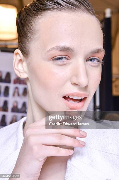 Model poses backstage at the Herve Leger by Max Azria fashion show at The Theatre at Lincoln Center on February 14, 2015 in New York City.